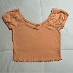 Pacsun Short Sleeve Top Brand New!!! Never Been Worn Color: Orange/Peach Size: Small Casual Solid Color Crop Top For Summer, Casual Solid Crop Top For Summer, Trendy Solid Color Tops For Beach Season, Trendy Solid Tops For Beach Season, Cute Short Sleeve Crop Top For Summer, Cute Short Sleeve Summer Crop Top, Summer Vacation Scoop Neck Crop Top, Summer Scoop Neck Crop Top For Vacation, Summer Peach Tops For Day Out