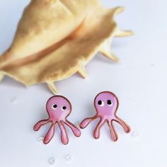 "Lovely marine earrings Pair Funny purple Octopuses Cute earrings for a good summer mood Beautiful small gift for your girlfriend I made these small earrings from polymer clay and copper wire. Earrings covered with UF epoxy varnish The small Octopuses have a size of about 2.5 cm or 1\" Each purchase comes carefully packaged and is ready for gift-giving If you would like to add a congratulatory letter to your package, let me know! Please leave me your instructions in the message box at checkout. Playful Pink Earrings For Beach, Pink Resin Novelty Earrings, Handmade Playful Beach Earrings, Playful Handmade Earrings For Beach, Playful Handmade Beach Earrings, Summer Gift Polymer Clay Earrings, Summer Gift Earrings In Polymer Clay, Summer Polymer Clay Earrings For Gifts, Cute Handmade Enamel Earrings