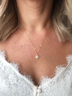 "This is a stunning piece that will catch anyone's eye. Makes a beautiful gift or great for everyday wear and layering MATERIAL: -14K Gold Filled (all components of necklace) -Measurement : 17mm X 13mm -CZ stones and white opal stone in center -Lead Free & Cadmium Free & Nickel Free Model is wearing 18\" length All orders come packaged ready for gifting! Order also comes with a, Jewelry Care Instruction Card. MADE TO ORDER Handmade with Love ►WHAT IS 14K GOLD FILL? 14k gold fill is a gen Gold Dainty Jewelry With Star Charm, Dainty Gold Jewelry With Star Charm, Dainty Starburst Yellow Gold Jewelry, 14k Gold Filled Star Jewelry For Gifts, Star-shaped 14k Gold Filled Jewelry Gift, Elegant 14k Gold Filled Star Jewelry, Elegant Star-shaped 14k Gold Filled Jewelry, Elegant Starburst Jewelry As Gift, Elegant Starburst Jewelry Gift