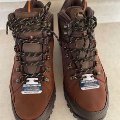 Mens Hiking Boots Size 11 Never Worn Skechers Brand Waterproof Brown Lace-up Boots, Brown Weatherproof Lace-up Boots, Brown Ankle-high Hiking Boots, Brown Work Boots With Cushioned Footbed For Outdoor Work, Brown Cushioned Work Boots For Outdoor, Brown Hiking Boots With Reinforced Round Toe, Rugged Brown Waterproof Ankle-high Boots, Rugged Ankle-high Waterproof Brown Boots, Rugged Brown Ankle-high Waterproof Boots