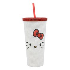 a hello kitty cup with a straw in it