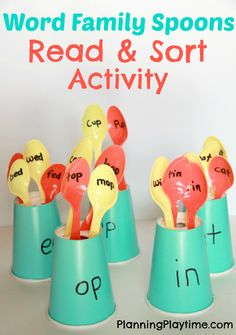 the word family spoons read and sort activity is shown in three cups with spoons sticking out of them