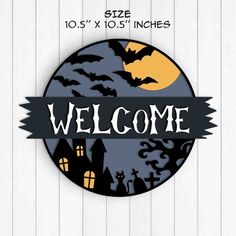 a welcome sign with bats on it and the words,'welcome'in front of a