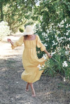 Style // Think cool, stylish, effortlessly beautiful. A subtle, soothing and summer infusing yellow linen! Dreamy in every sense of the word For your wearing pleasure. The Deia Dress is a midi to long length dress with a slightly scooped neckline and tiered skirt. It features an elastic bodice to fit perfectly to any s Elegant Yellow Midi Dress With Square Neck, Elegant Yellow Square Neck Midi Dress, Summer Midi Dress With Straight Neckline For Brunch, Linen Square Neck Midi Dress For Garden Party, Square Neck Linen Midi Dress For Garden Party, Spring Linen Midi Dress With Square Neck, Linen Square Neck Midi Dress For Spring, Square Neck Linen Midi Dress For Spring, Spring Vacation Linen Dress With Square Neck