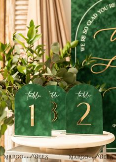 the table numbers are green and gold