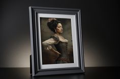 a portrait of a woman in a black dress is displayed on a table with a dark background