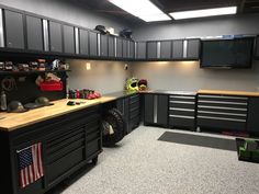 an organized garage with lots of work tools