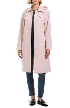 Commute in this water-resistant trench coat cut from a cotton-nylon blend with a center button closure, removable tie belt and handy flap pockets. 40" length (size Small) Button front closure, removable waistbelt Removable hood Lined 100% polyester with polyurethane coating Machine wash, tumble dry Imported Long Pink Trench Coat, Cheap Pink Hooded Raincoat, Pink Trench Coat Nordstrom, Classic Pink Single-breasted Outerwear, Spring Long-sleeved Raincoat With Button Closure, Single Breasted, Kate Spade New York, Flap Pocket, Blush Pink