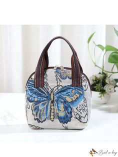 BirdinBag - Embroidered Butterfly Canvas Handbag with Phone Pouch - Stylish and Practical Blue Large Capacity Pouch For Daily Use, Blue Spacious Pouch For Daily Use, Blue Embroidered Bag For Daily Use, Portable Pouch Canvas Bag For Daily Use, Portable Canvas Pouch Bag For Daily Use, Blue Embroidered Canvas Bag For Daily Use, Embroidered Satchel Canvas Bag For Everyday Use, Embroidered Canvas Satchel For Daily Use, Embroidered Canvas Satchel For Everyday Use