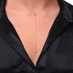 "✦ Lariat Y Necklace ✦  ✧ DESCRIPTION & DETAILS Discover sophistication in simplicity with our 14k solid gold diamond lariat. Adorned with a radiant 1.8mm diamond in the upper section and a dangling gem below, its elegance redefined. Elevate your style effortlessly with this timeless piece that speaks volumes in understated luxury. 📅 Made to order, 3-5 business days 🛫 Fast 2-3 day Shipping  ❶ 100% 14k solid gold ❷ Two Diamonds 1.8mm & 2.5mm ❸ Total Carat Weigth: 0.085ct F-G SI1 ❹ Drop chain pendant: 10cm ❺ Adjustable Length ❻ Circle's Diameter: 8mm  ✧ MATERIALS - Ethically Sourced Diamonds Diamonds are one of the hardest natural materials on the planet. Our high-quality diamonds (SI 1-2 clarity) are sourced ethically from suppliers who commit to conflict-free and socially responsible pra Gold Lariat Necklace, Butterfly Necklace Gold, Eternity Ring Gold, Luxury Jewelry Brands, Gold Long Necklace, Gold Armband, Valentines Necklace, Station Necklace, Lariat Necklace