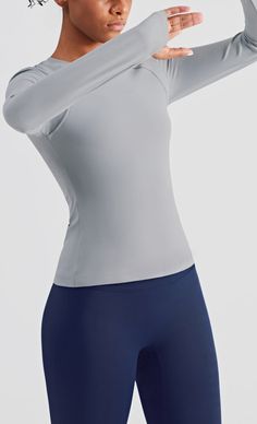 The Emes Shop sports bra is detailed with a high round scoop neckline.full length long sleeves. a built-in lined bra. and ends past the waist. This light-weight. quick-drying. buttery soft compressing sportsbra features all the support and comfort you need. while still looking cute.MATERIAL:75% Nylon. 25% Spandex MEASUREMENTS:Small : 4-6Waist: 25-26.5 inChest: 33-34.5 inMedium : 6-8Waist: 26.5-28 inChest: 34.5-36 inLarge : 8-10Waist: 28-29.5 inChest: 36-37.5 in Fitted Long Sleeve Shirt, Eatonton Georgia, Fitted Long Sleeve, Light Beige, Scoop Neckline, Long Sleeve Shirt, Soft Fabrics, Unique Style, Sleeve Shirt