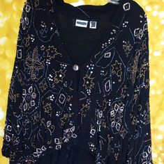 Gorgeous! Chicos Brand Black Mesh Material Under Beautifully Embellished & Embroidered Top Layer. One Button Front. Wide 3/4 Sleeves. Perfect Over The Black Cocktail Dress Or Elegant Evening Pants. No Low-Ball Offers On This Beauty Accepted As They Will Be Automatically Declined. Thank You. Fitted Long Sleeve Festive Cardigan, Festive Long Sleeve Fitted Cardigan, Fitted Long Sleeve Embellished Cardigan, Embroidered Long Sleeve Blouse For Night Out, Festive Long Sleeve Cardigan For Fall, Festive Long Sleeve Blouse For Fall, Festive Black Spring Outerwear, Bohemian Long Sleeve Cardigan For Party, Festive Long Sleeve Casual Outerwear