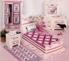 the doll is sitting on her bed in this crochet pattern for barbie's bedroom