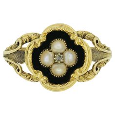 This is a wonderfully hand made yellow gold Victorian mourning ring. The ring is set with a central rose cut diamond in a cut collet setting and is surrounded by four original natural pearls in a quatrefoil shaped face. The inside of the ring is inscribed with the words 'In Loving Memory Of My Dear Husband' and the back features a locket compartment. Condition: Used (Very Good) Weight: 2.7 grams Face Dimensions: 13.5mm x 13mm Pearls: 4 (2.75mm) Diamond: 1 (1mm) UK Ring Size: S Hallmarked: Yes, London 1835 Maker's Mark: ED Period: Victorian Box: The Vintage Jeweller Gift Box Bohemian Style Rings, Face Dimensions, Dear Husband, Locket Ring, Punk Vintage, Vintage Things, Gothic Wedding, La Face, Loving Memory