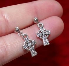 "Antique silver tone double sided small cross charm earrings. Earring length: 24mm (including the ball); 1\" Cross size: 15mm x 9mm Stud material: stainless steel This listing is for one pair of cross earrings with rubber backs. This earring will come in a gift bag. I offer combined shipping costs which give you a shipping discount for ordering multiple items from my shop. Earrings care: Take them off while you sleep, sports activities, bathing, having a shower. Avoid contact with chemicals, hig Plastic Earrings, Funky Jewelry, Small Crosses, Cross Earrings, Jewelry Outfit, Cross Charms, Sports Activities, Dream Jewelry, Metal Necklaces