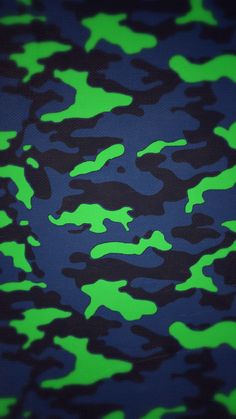 green and black camouflage print fabric