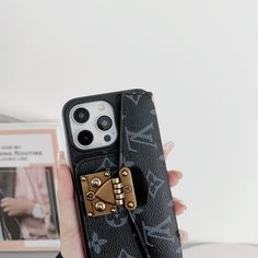 a woman is holding up her phone case with a bow on the front and side