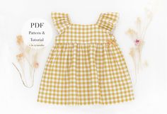 a yellow and white checkered dress next to dried flowers on a white background with the text pdf pattern & tutor