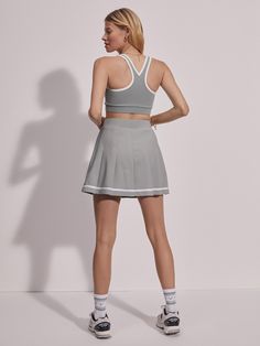 This elegant skort is made from structured yet breathable stretch twill and features a classic pleated design with a contrast tape detail at the hem. Cut to a slightly longer length for enhanced coverage, the built-in pocket shorts make this style perfect for on-the-go. Pocket Shorts, Shorts With Pockets, Long Length, Long A Line, Built In, High Rise, Design