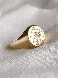 Gold plated brass1mm band thicknessface of ring : 9mm x 11mm*this ring runs 1/2 size small, please order up if you’re in between sizesThe artwork that’s engraved on the ring based on Diana, who was a roman goddess of the hunt & the moon, and had the power to talk to animals. Handmade in NC. Goddess Of The Hunt, Diana Ring, Roman Goddess, Coin Ring, Gold Alloys, Vermeil Jewelry, Solid Gold Jewelry, Gold Filled Jewelry, Gold Filled Chain