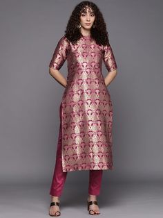 Mauve woven design Kurta with TrousersKurta design:Floral woven designStraight shapeRegular styleRound neck, short regular sleevesCalf length length with straight hemSilk blend machine weave fabricTrousers design:Solid TrousersPartially elasticated waistbandSlip-on closure Festive Pink Workwear Sets, Pink Festive Workwear Sets, Elegant Silk Short Sleeve Sets, Elegant Short Sleeve Kurta For Festive Occasions, Diwali Short Sleeve Sets, Short Sleeve Silk Sets For Festivals, Elegant Pink Short Sleeve Sets, Pink Short Sleeve Sets For Workwear, Festive Pink Short Sleeve Set