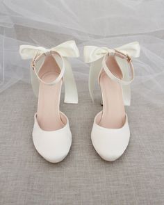 An all-time classic and elegant style with simplicity of satin heels with a satin back bow. DETAILS:HEEL HEIGHT: 3 inchesCOLORS AVAILABLE: Champagne, White, Ivory, Navy, Burgundy, and Light BlueUPPER: Synthetic upper and liningMATERIALS: Mandmade outsoleSTYLE NAME: SARAH Simple Wedding Hells, Quince Shoes Small Heel, Brides Shoes Block Heel, Bridesmaid Shoes Teen, Dream Wedding Shoes Simple, Classy Short Wedding Heels, Cute Comfy Hoco Shoes, Bow Bride Shoes, White Wedding Shoes 1.5 Invh