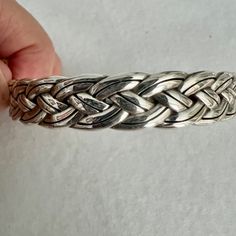 2.5" Diameter .5" Wide Adjustable Braided Metal Bracelets, Formal Adjustable Braided Bracelet, Formal Adjustable Braided Bracelets, Adjustable Braided Bangle Jewelry, Silver Braided Bangle Bracelets, Silver Braided Bangle Bracelet With Sterling Silver Clasp, Sterling Silver Braided Bangle Bracelet, Adjustable Braided Cuff Bracelet, Nickel-free Metal Braided Bracelets