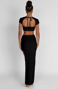 An elegant yet sexy choice for cocktail parties, our Adorn maxi is one that you'll want to wear again and again. Cut from stretch jersey that's smooth and super sculpting, it features a low waist fit and thigh high split. Best styled with the matching Adorn crop top.



Colour: Black.

Premium stretch jersey.

Low waist fit.

Thigh high split.

Moulds to body figure.

Cropped length.

Model is an XS and is wearing an XS.

 Size: XS, S, M, L, XL, XXL Thigh Split Skirt, Homecoming Dresses Corset, Midi Dress Wedding Guest, Split Long Dress, 29th Birthday, Body Figure, Maxi Dress Sale, Sparkle Dress, Cocktail Parties