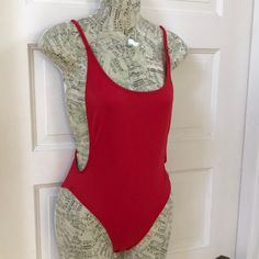 Nwot Yandy Monokini Swimsuit Red One Piece Sz Medium Low Cut Back Open Sides. 3 Layers Of Red Fabric. No Cups. Straps Adjust At Back. New And Unworn. Sleek And Sexy. Stretch Red One-pieces For The Beach, Red Stretch One-piece Swimsuit, Red Lined Beach One-piece, Red Monokini, Red One-piece Swimsuit With Lined Body, Red One-piece Cutout Swimwear, Monokini Swimsuit, Red One Piece, Monokini Swimsuits