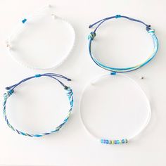 Adjustable Bracelets For Friendship And Beach Season, Casual Braided Strand Bracelets As Gift, Casual Braided Strand Bracelet As Gift, Adjustable Braided Bracelets For Beach Season, Casual Beaded Bracelets With Sliding Knot For Vacation, Casual Adjustable Braided Bracelets For Beach, Adjustable Casual Braided Bracelet For Beach Season, Adjustable Friendship Bracelets For Beach Season Gifts, Adjustable White Friendship Bracelets For Beach Season