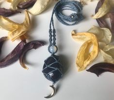 Our gorgeous Blue Goldstone Macrame Pendant is now available to purchase!  Made with love and care, this gorgeous shiny Blue Goldstone and a cute moon charm, this pendant is totally adjustable as usual!  * The Blue Goldstone is a protective stone that deflects bad energies, and brings good luck. It is a man made stone but is highly regarded in the spirit realm as a protection mineral because it symbolises connection to the higher realms of consciousness and psychic awareness, increasing spiritua Adjustable Celestial Crystal Necklaces With Moon Charm, Handmade Spiritual Moon-shaped Crystal Necklace, Adjustable Celestial Crystal Necklace With Moon Charm, Handmade Celestial Crystal Necklace In Moon Shape, Handmade Blue Moon Necklaces, Handmade Celestial Crystal Necklace With Moon Shape, Handmade Celestial Moon Crystal Necklace, Handmade Blue Moon-shaped Necklaces, Adjustable Bohemian Crystal Necklace With Moon Charm