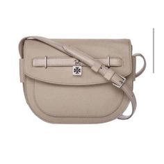 Curved Crossbody Bag In Pebbled Leather Beige Flap Bag With Magnetic Closure For Travel, Beige Crossbody Bag With Palladium Hardware, Luxury Beige Saddle Bag For Travel, Chic Saddle Bag With Silver-tone Hardware For Travel, Beige Office Bag With Silver-tone Hardware, Tan Crossbody Bag With Silver-tone Hardware, Leather Crossbody Bags, Crossbody Bags For Women, Tory Burch Bags