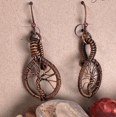 Aged copper tree of life earrings Bronze Wire Wrapped Drop Earrings, Artisan Copper Wire Drop Earrings, Copper Wire Dangle Earrings As Gift, Copper Dangle Jewelry As Gift, Nature-inspired Copper Earrings As Gift, Adjustable Copper Jewelry For Pierced Ears, Copper Dangle Jewelry For Gift, Artisan Copper Wire Dangle Jewelry, Copper Teardrop Wire Wrapped Jewelry