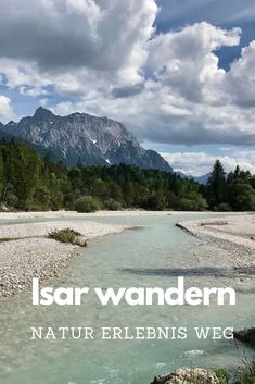 a river with mountains in the background and text overlay that reads lasr wandern natur erebens weg