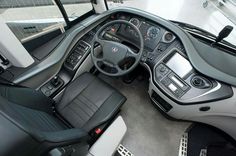 the interior of a vehicle with black leather seats