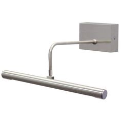 a wall mounted light that is on the side of a white wall and has a metal arm