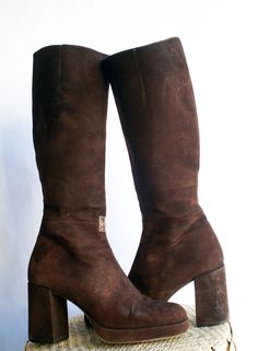 Vintage 80s Charles David Brown Suede Knee Hi Leather Boots in great vintage condition. May show some minor signs of normal wear.  *Brand: Charles David *Color: Brown *Size: 7.5 *Style: Platform knee High Boots *Heel: 3.15 wrap heel *Shaft Height : 15.55" *Cirxumference: 14.5  *Material: Suede upper, leather lining, leather soles *Condition: Vintage Good Suede Platform Boots, Platform Knee High Boots, Boots Heel, High Heel Boots Knee, Wrap Heels, Charles David, Platform Boots, Brown Suede, Boot Shoes Women