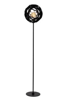 a black floor lamp with a flower on it