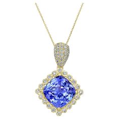 If you're looking for a truly unique and stunning piece of jewelry, look no further than this beautiful 10.61ct Tanzanite Pendant. Tanzanite is a rare and highly sought-after gemstone, known for its striking violet-blue color. The 0.83ct diamonds add even more sparkle and shine, creating a dazzling effect. The 18K Yellow gold setting provides a warm and luxurious finish. This pendant is perfect for anyone who loves unique and beautiful jewelry. It would make a fantastic gift for a loved one or a Gia Certified Dazzling Tanzanite Jewelry, Jewelry Nails, Dazzling Jewelry, Tanzanite Pendant, Bleu Violet, Yellow Gold Setting, American Diamond, Fantastic Gifts, Round Cut Diamond