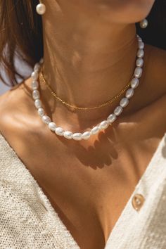 Meet Willow! Our boldest pearl necklace yet. Add an effortless touch of coastal elegance to any look with the Willow Pearl Necklace. Crafted with unique, timeless pearls, this necklace will add an exclusive, tasteful bit of luxury to any outfit. Freshwater Pearls 14"-17" long Handcrafted with love in San Clemente Luxury Minimalist Pearl Necklace With Pearl Charm, Affordable Elegant Pearl Layered Necklace, Luxury Minimalist Pearl Necklace, Luxury Timeless Pearl Necklace, Luxury Minimalist Pearl Chain Necklace, Luxury Minimalist Pearl Charm Necklace, Luxury Everyday Pearl Necklaces, The Perfect Pearl Necklace, Luxury Minimalist Jewelry With Pearl Charm