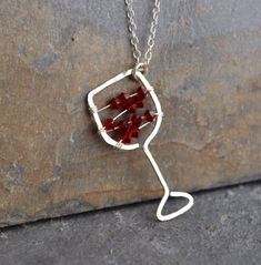 I'll have a glass of your finest red! Maybe you love the less-serious side of jewelry. Maybe you just love wine! I know I do. This hand-hammered necklace is sure to bring smiles and conversation wherever you go. Tiny Swarovski crystal beads strung on sterling silver wire stand in for your favorite red. The pendant is approximately 0.5 inches wide and approximately 1.25 inches long. Choose your chain length, or leave a note to seller if you would like a chain length other than those listed. All i Sterling Silver Necklace For Valentine's Day Party, Silver Necklaces For Mother's Day Party, Sterling Silver Birthstone Necklaces For Parties, Mother's Day Party Sterling Silver Necklace, Personalized Sterling Silver Necklaces For Party, Sterling Silver Jewelry For Mother's Day Party, Silver Wire Wrapped Necklace For Valentine's Day, Wire Wrapped Jewelry For Valentine's Day Anniversary, Valentine's Day Silver Wire Wrapped Necklaces