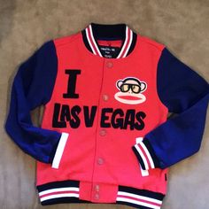 Red Jacket With Blue Sleeves ‘Las Vegas’ Varsity Style Jacket. Trim Is Black, Red And White. Width Is 14.5 Inches. Length From Shoulder To Hem Is 19 Inches. Toddler Boy Hoodie, Red Puffer Jacket, Red Puffer, Ski Girl, Varsity Style, Paul Frank, Kids Coats, Boys Hoodies, Boys Jacket