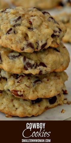 three cookies stacked on top of each other with the words cowboy cookies written below them