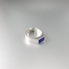 Beautiful modern ring with Lapis Lazuli and Sterling silver. Unique gift for her or him, girlfriend, wife, mom, friend, September and December birthstone, 8 year anniversary. The natural blue Lapis Lazuli stone is cut to a rectangle shape and set in Sterling silver. This beautiful ring is worked with the technique of inlay, which means the stone is worked seamlessly into the Sterling silver. All our inlay work is real stone, not ceramic stone dust. All our stones are natural stones and our jewel Mom Friend, Malachite Rings, Lapis Lazuli Ring, Lapis Lazuli Stone, Modern Ring, Blue Lapis, Real Stone, Unique Gifts For Her, December Birthstone