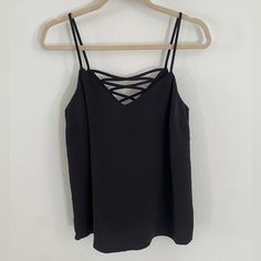 Super Simple And Elegant. Can Be Casual, Fancy, Corporate, Or Edgy! Never Worn Before! Chic Strappy Tops For Night Out, Black Strappy Tops For Party, Black Party Tops With Straps, Black Strappy Party Tops, Casual Party Tops With Straps, Chic Black Camisole Blouse, Casual Tank Blouse For Night Out, Elegant Strappy Tops For Night Out, Black Strap Top For Spring