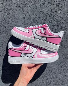 The Pink Cartoon Custom Air Force 1 shoes are made from high-quality materials and feature a unique pink cartoon design. They offer superior comfort and durability, making them perfect for everyday wear. The design is stylish and eye-catching, and is sure to turn heads. Exactly as shown in the pictures. 📷 Brand New & Authentic. 💯 Hand Painted with attention to detail. 👨‍���🎨 Waterproof and Flexible. ❤️ Unisex model. Please refer to the Size Chart. 👟👫 Free Worldwide Shipping. ✈️🌍 Pink Air Force 1, Custom Sneakers Diy, Air Force 1 Sneakers, Pink Cartoon, Custom Painted Shoes, Custom Shoes Diy, Nike Shoes Air Force, Painted Sneakers, Nike Fashion Shoes