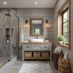 a bathroom with gray walls and wooden accents