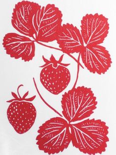 a red and white drawing of strawberries on a branch with leaves in the background