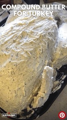 a close up of a cake in a pan on a table with the words compound butter for turkey