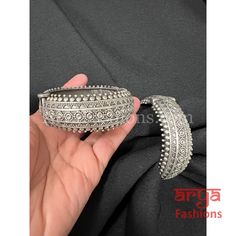 Handmade Silver Oxidized Bracelet Gokhroo Bangles- Available Size: 2.6. Can fit size 2.8 due to openable feature.- Silver Oxidized Bracelet bangles in silver finish.- Very Elegant and stylish, these bracelet bangles can be paired with any Attire depending upon the occasion and the theme. - The base is pure brass (90%) and pure 92.5 silver (10%) which makes this very sturdy and of good quality. - 100% guarantee on the finish- it will not lose its finish/color/shine. - Very lightweight and Hand ca Silver Fusion Bangle For Festive Occasions, Silver Fusion Style Bangle For Festive Occasions, Silver Festive Fusion Bangle, Bohemian Silver Bangle Hand Set, Silver Openable Bracelets As A Gift, Silver Bohemian Bangle With Hand Set Details, Silver Openable Bracelets For Gift, Hand Set Silver Bohemian Bangle, Silver Openable Bangle Jewelry